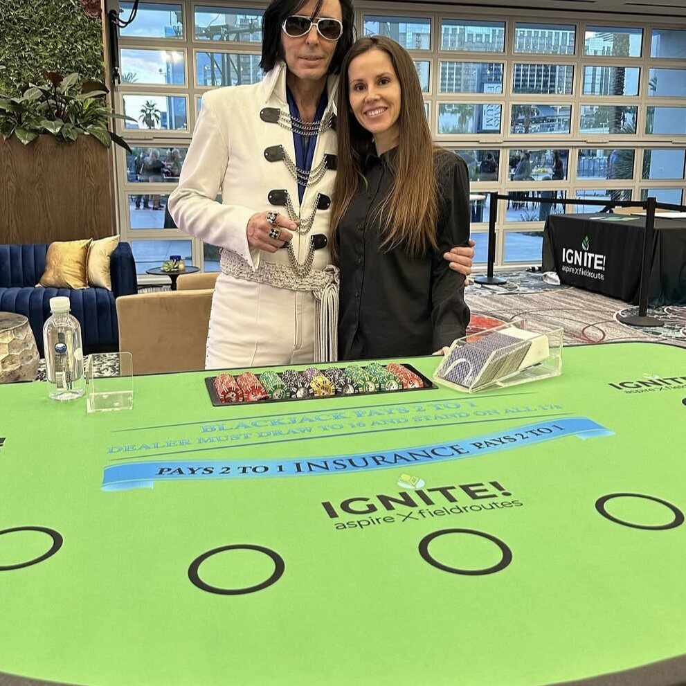 Guests at a custom blackjack table at a Honolulu corporate casino party